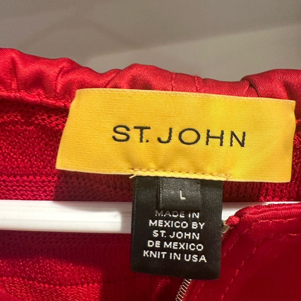 St. John Small woman’s sweater with hood.